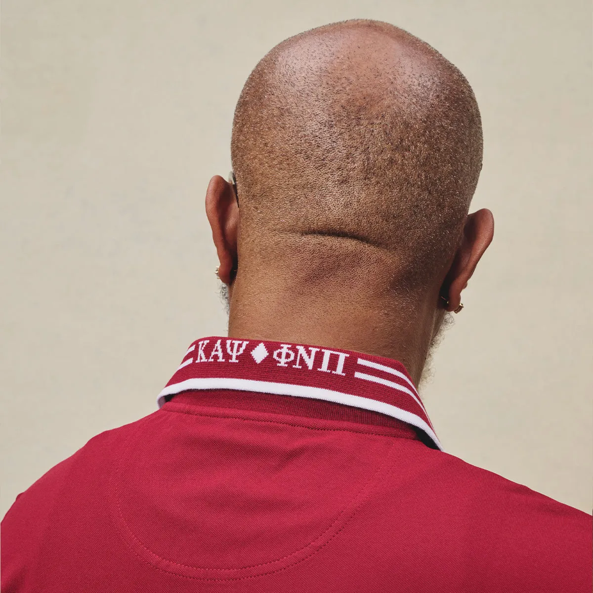 Kappa Alpha Psi Coat of Arms Striped Performance Polo