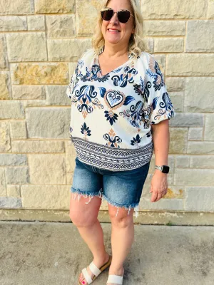 Mid Rise Raw Frayed Hem Denim Shorts