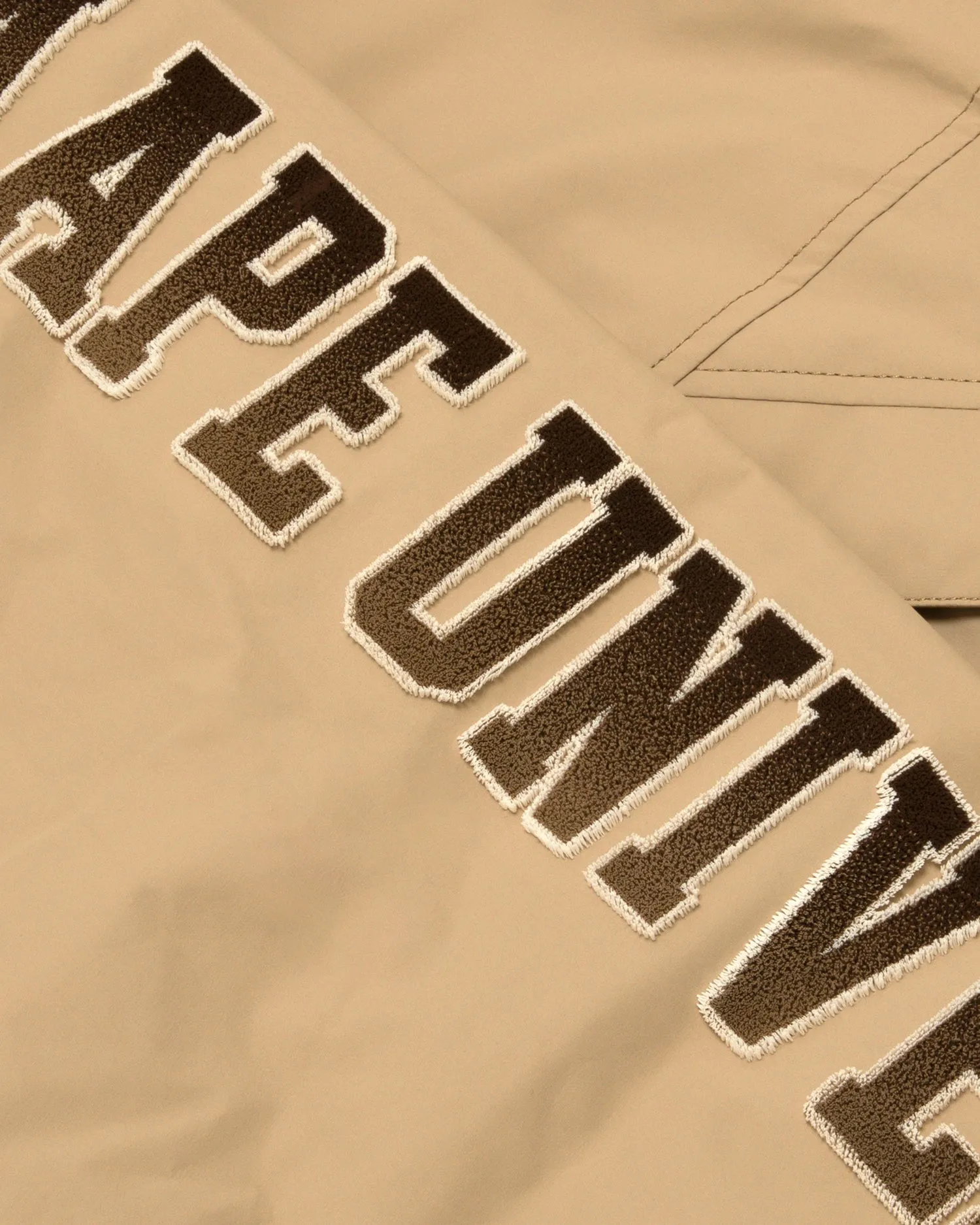 Moonface logo hooded down jacket