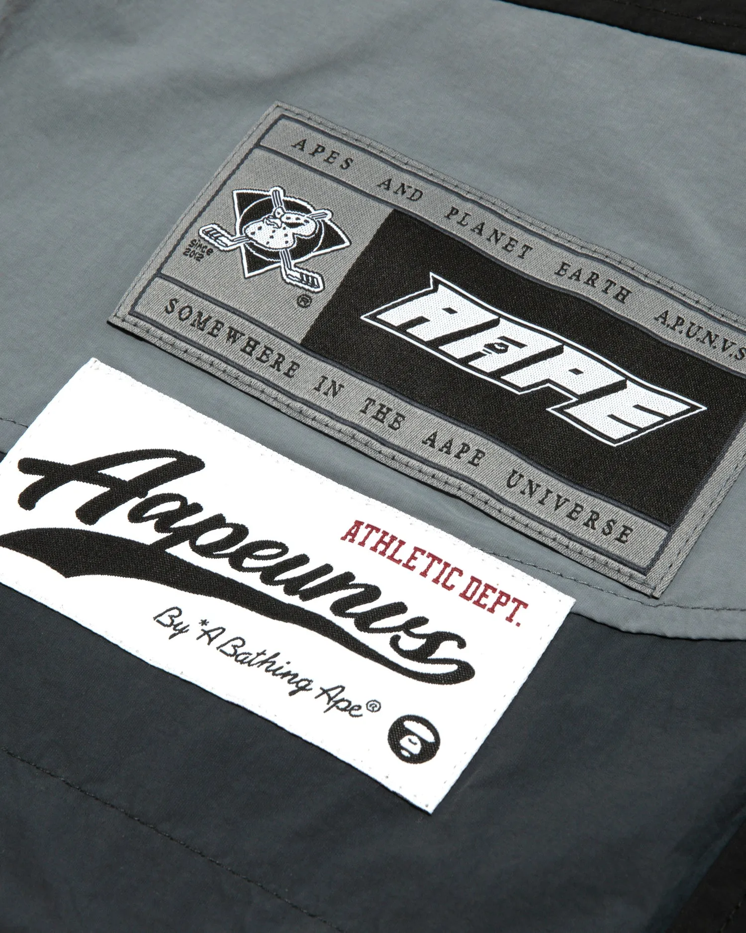 Moonface logo stripe hooded jacket
