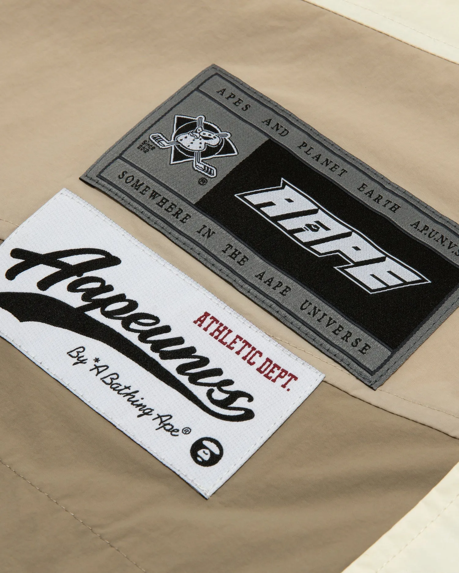 Moonface logo stripe hooded jacket