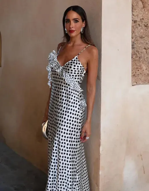 Polka Dot Maxi Dress with Floral Embellishment and Ruffle Detail